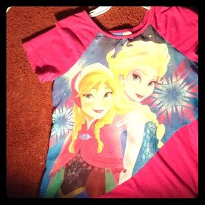 I'm selling a pink Elsa and Anna shirt.